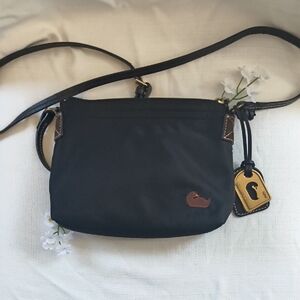 Dooney & Bourke Black Crossbody Bag with Brown Accents